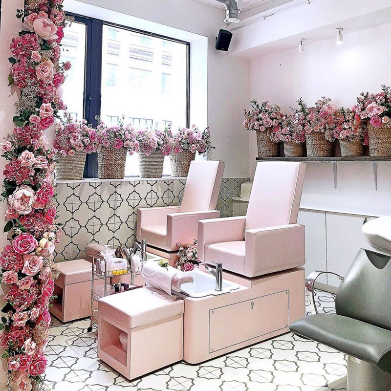modern art deco pink flower salon with pink chairs