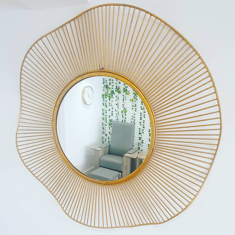 round gold mirror for salon