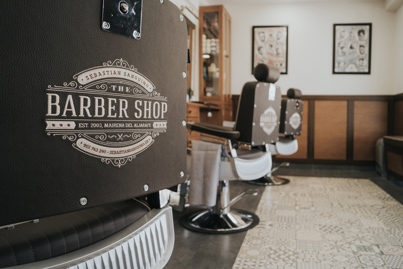 barbers shop with black barbers chairs